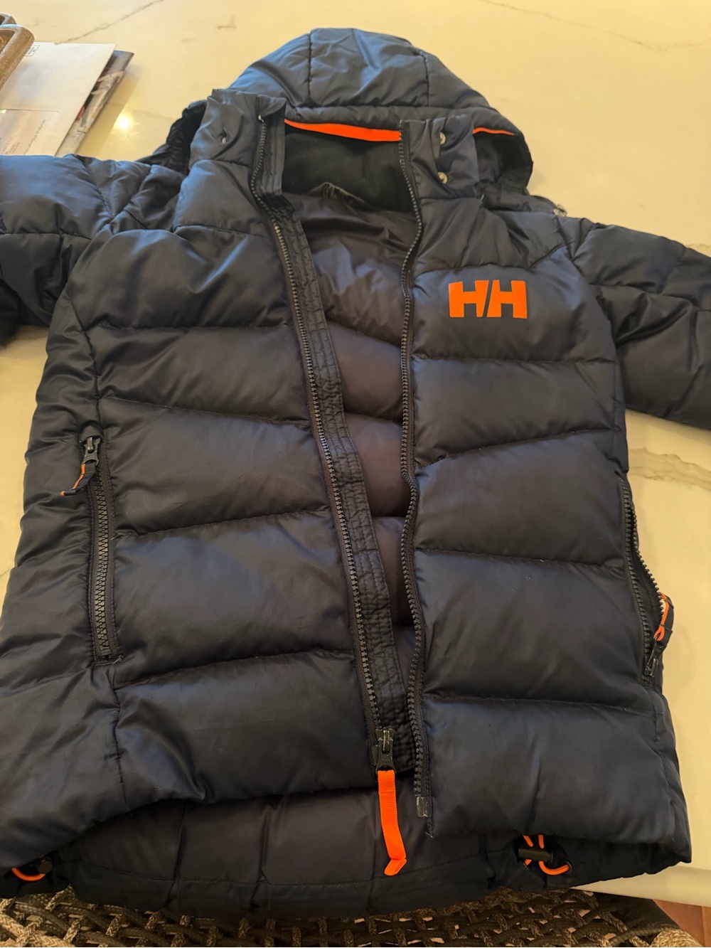 Helly Hansen Navy Puffer Jacket with Orange Logo and Trim